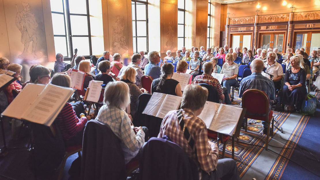 Singing in unison.